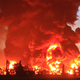 A massive fire rages at the Balongan refinery, operated by state oil company Pertamina, in Indramayu, West Java, on March 29, 2021.